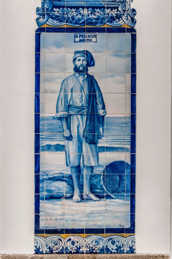 The Fisherman panel on the azulejo-covered facade of the old train station - Aveiro, Portugal - rossiwrites.com