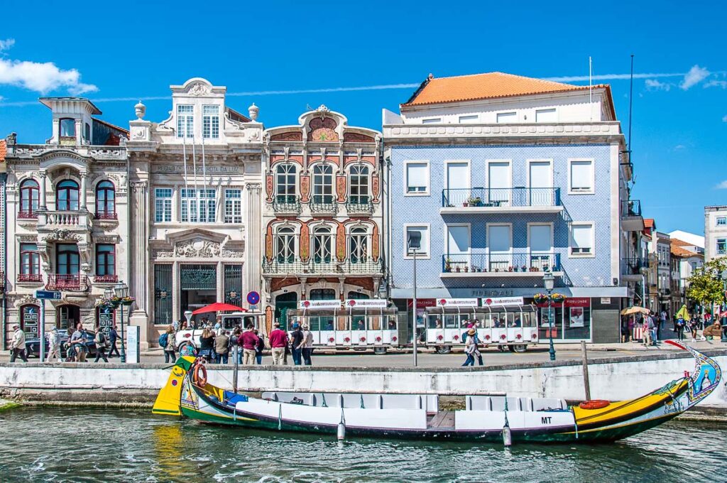 Canal Central with a moliceiro boat and Art Deco Houses - Aveiro, Portugal - rossiwrites.com