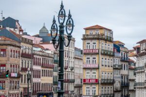 Historic facades seen from the entrance of the Sao Bento train station - Porto, Portugal - rossiwrites.com