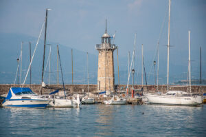 The 19th-century lighthouse and the marina - Desenzano del Garda, Italy - rossiwrites.com