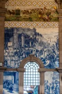The azulejo-covered vestibule of the historic Sao Bento Train Station - Porto, Portugal - rossiwrites.com