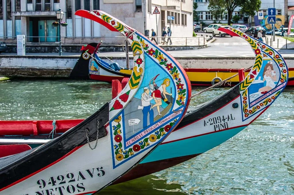 The decorative panels of traditional moliceiro boats on Canal Central - Aveiro, Portugal - rossiwrites.com