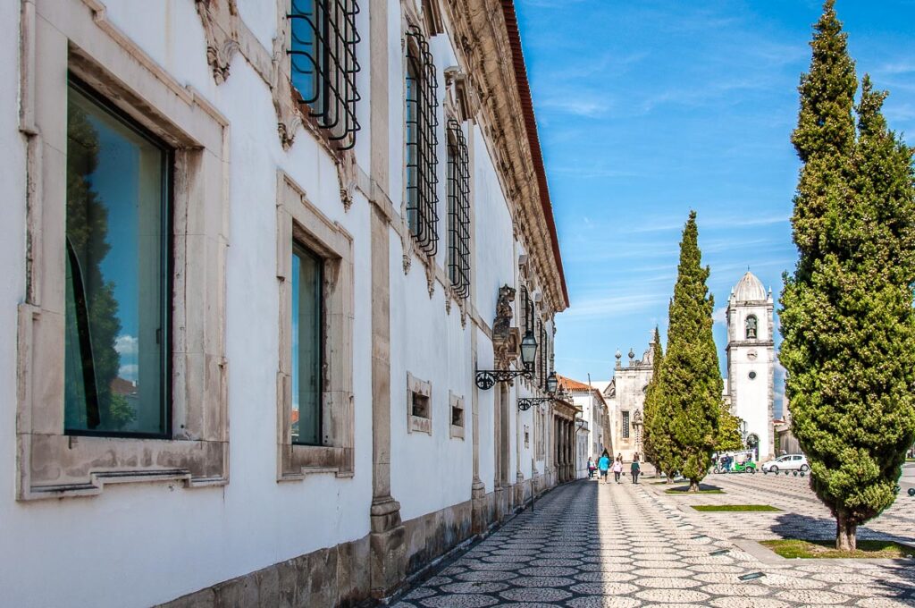 The facade of Mosteiro de Jesus with Se de Aveiro in the distance - Aveiro, Portugal - rossiwrites.com