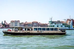 Venetian vaporetto and traghetto in the Giudecca Canal - Venice, Italy - rossiwrites.com