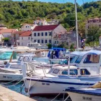 Boats in the harbour of the island of Zlarin in the Sibenik Archipelago - Dalmatia, Croatia - rossiwrites.com