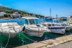 Boats in the harbour of the island of Zlarin in the Sibenik Archipelago - Dalmatia, Croatia - rossiwrites.com