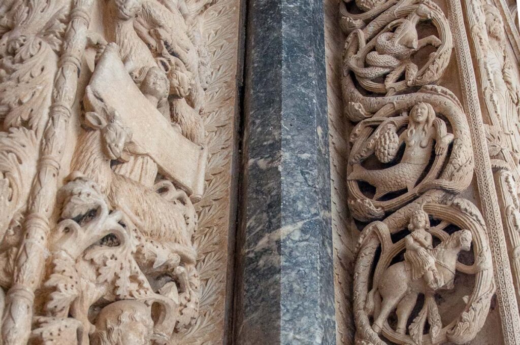 Close-up of the intricate details carved on the Radovan's Portal of the Cathedral of St. Lawrence - Trogir, Croatia - rossiwrites.com