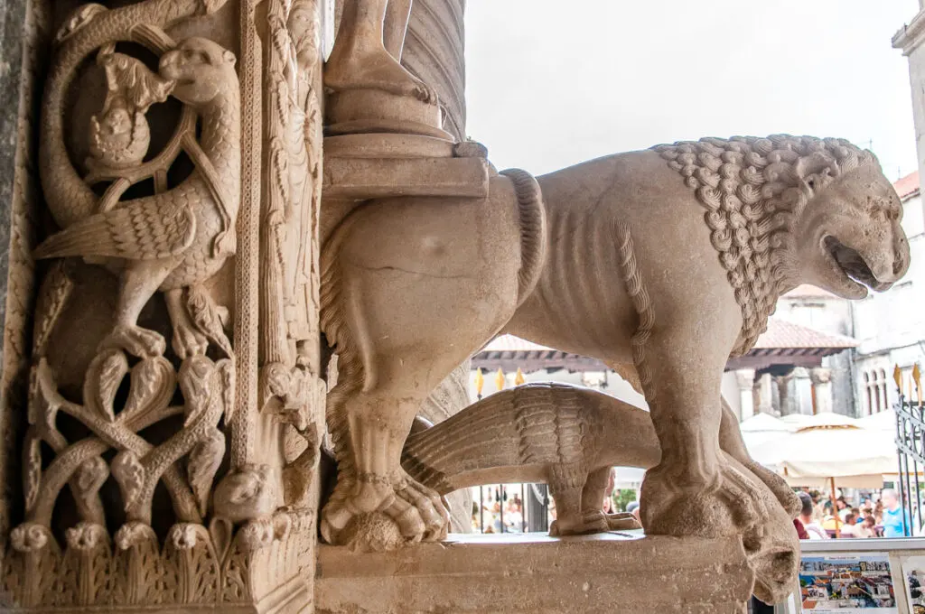 Details with a lion on the Radovan's Portal of the Cathedral of St. Lawrence - Trogir, Croatia - rossiwrites.com