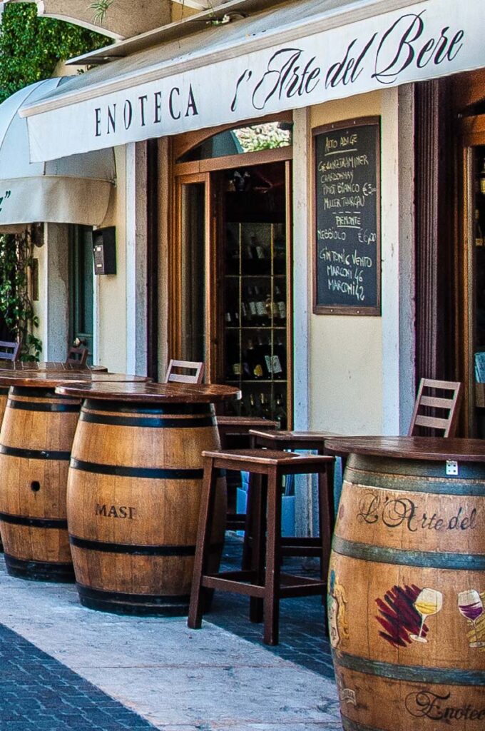 Enoteca with wine barrels in the town of Lazise - Lake Garda, Italy - rossiwrites.com