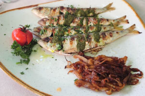Grilled sardines served in a small local restaurant - Sirmione, Italy - rossiwrites.com