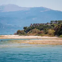 Jamaica Beach with Grotte di Catullo at the end of the Sirmio Promontory - Spiaggia Giamaica, Lake Garda, Italy - rossiwrites.com