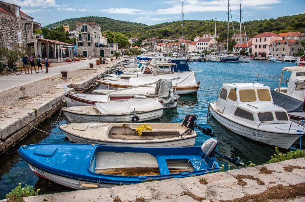 Picturesque harbour with boats on the island of Zlarin in the Sibenik Archipelago - Dalmatia, Croatia - rossiwrites.com