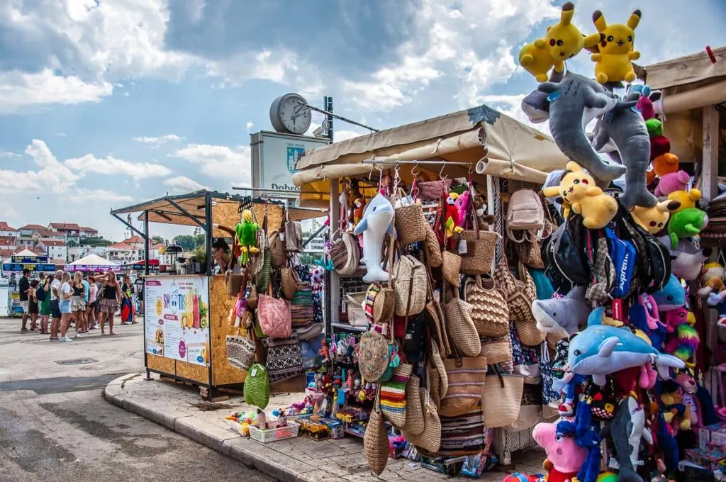 Stalls selling toys and souvenir near the Kamerlengo fortress - Trogir, Croatia - rossiwrites.com
