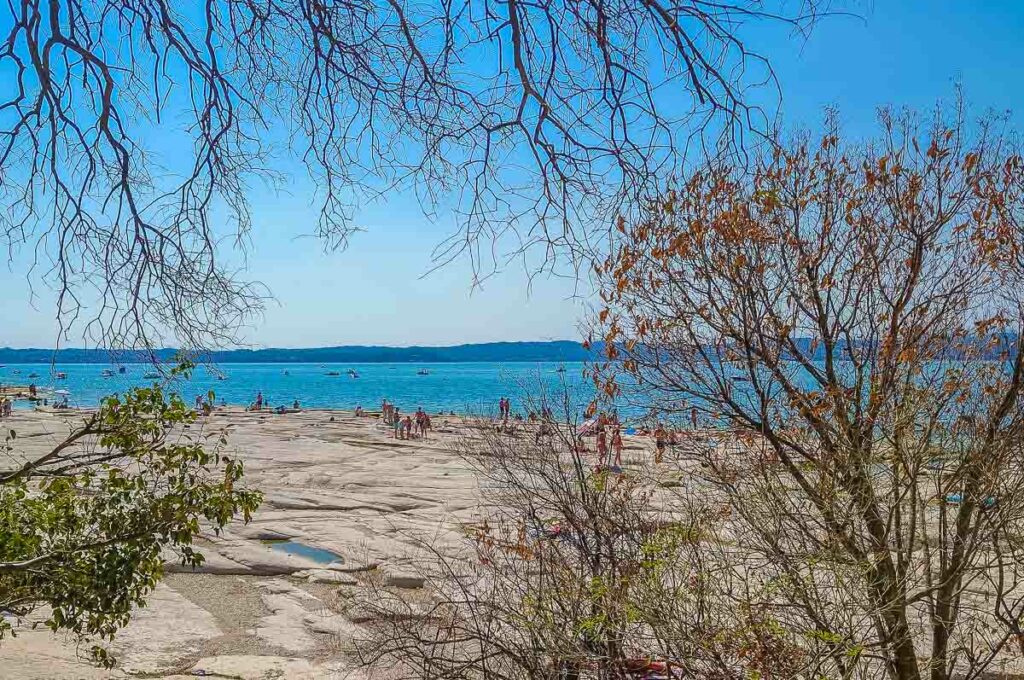 The flat rocks of Jamaica Beach - Sirmione, Lake Garda, Italy - rossiwrites.com