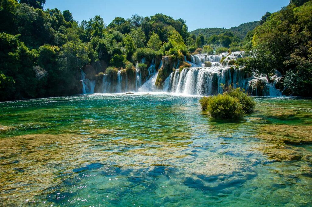 The waterfall Skradinski Buk seen from the bridge crossing the River Krka - Krka National Park, Croatia - rossiwrites.com