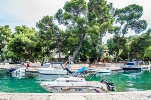 View of Park Zudika and the sea channel separating the town from the mainland - Trogir, Croatia - rossiwrites.com