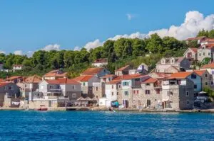 Waterside view of the village of Prvic Luka on the island of Prvic in the Sibenik Archipelago - Dalmatia, Croatia - rossiwrites.com