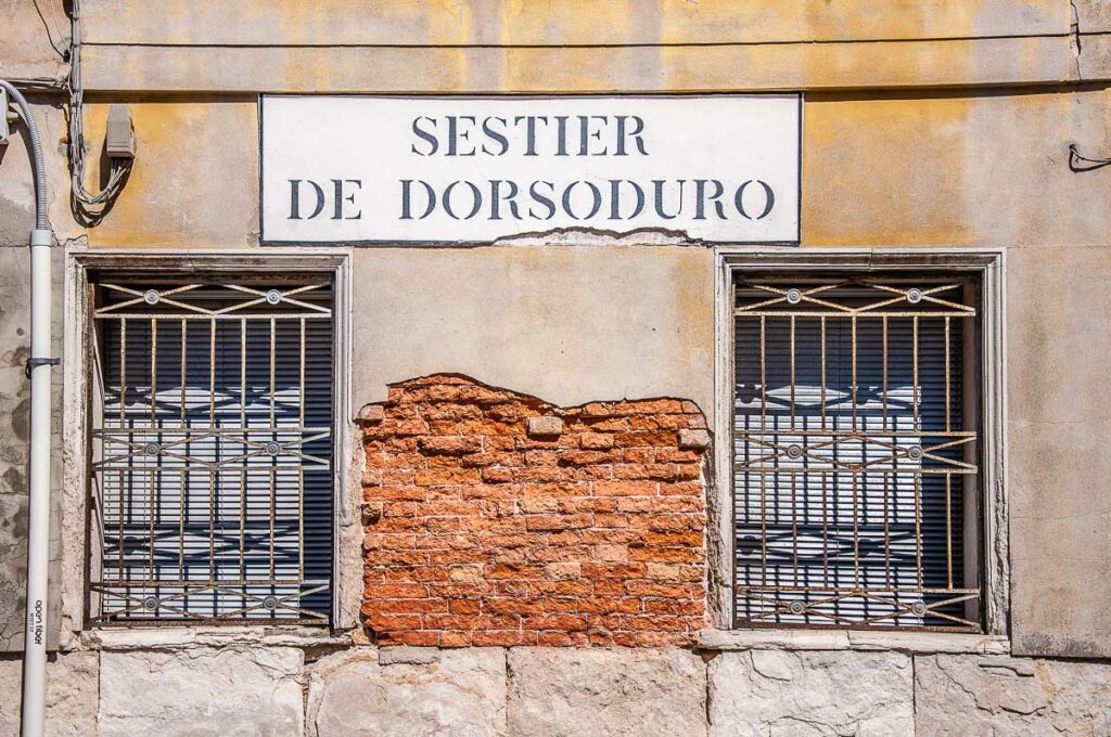 A street sign for the Sestiere of Dorsoduro - Venice, Italy - rossiwrites.com