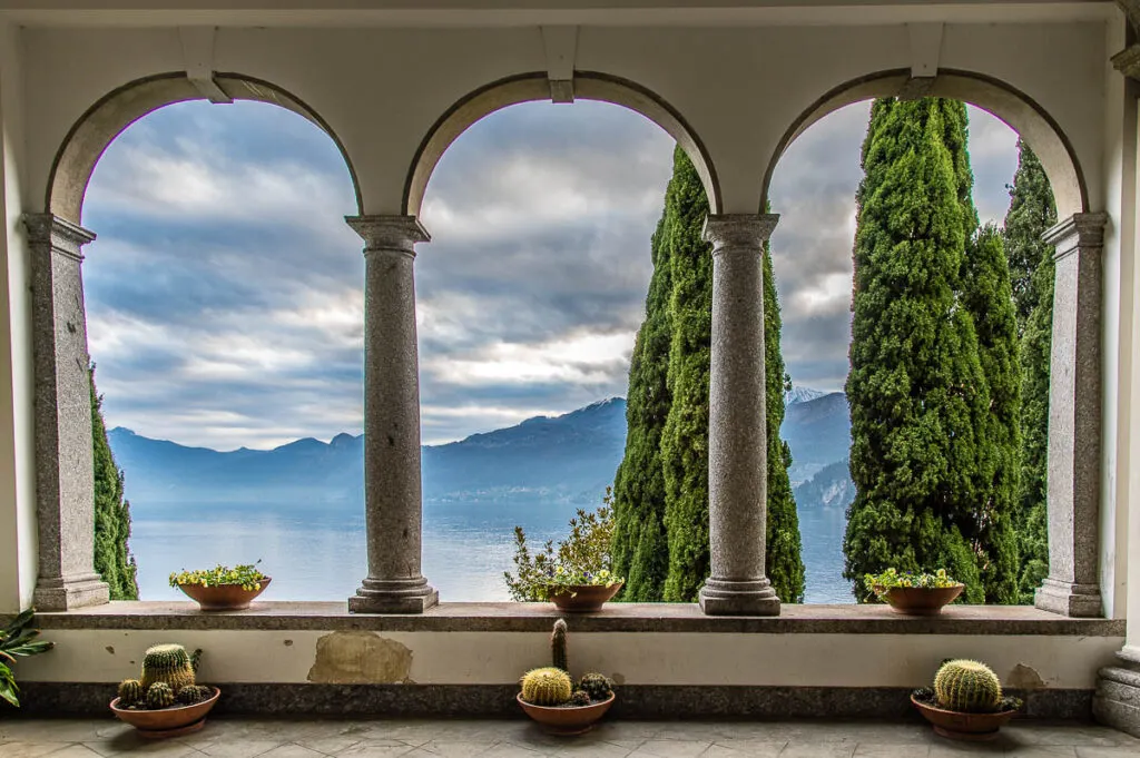 The blue expanse of the lake seen from the garden of Villa Monastero in the town of Varenna - Lake Como, Italy - rossiwrites.com