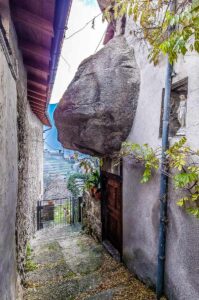 House built in the rocks in the town of Nesso - Lake Como, Italy - rossiwrites.com