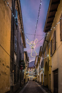 Sunset over the historic centre of the town of Cernobbio decorated for Christmas - Lake Como, Italy - rossiwrites.com