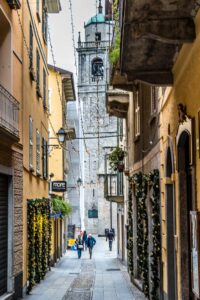 The belltower of the Basilica of San Giacomo in the historic centre of the town of Bellagio - Lake Como, Italy - rossiwrites.com