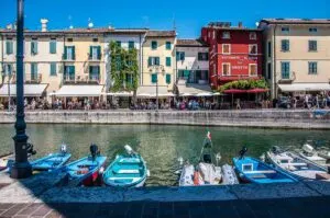 Boats in the old harbour in the historic centre of the town of Lazise - Lake Garda, Italy - rossiwrites.com