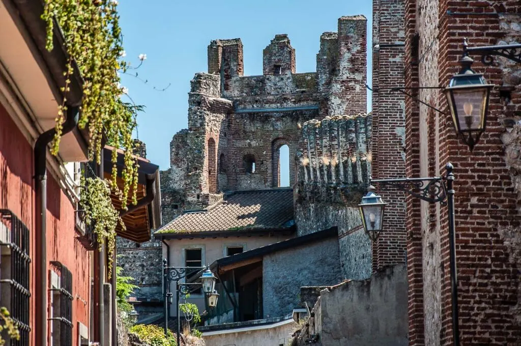 Medieval walls and house facades in the town of Lazise - Lake Garda, Italy - rossiwrites.com