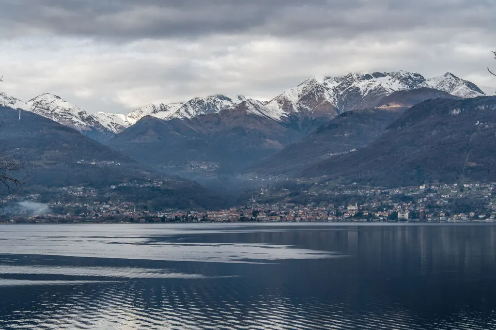 Panoramic view of the town of Gravedona with snow-capped mountains - Lake Como, Italy - rossiwrites.com