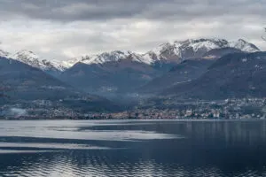 Panoramic view of the town of Gravedona with snow-capped mountains - Lake Como, Italy - rossiwrites.com