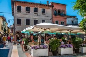 Restaurants and centuries-old houses in the historic centre of the town of Lazise - Lake Garda, Italy - rossiwrites.com