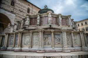 The historic fountain Fontana Maggiore on the central square Piazza IV Novembre - Perugia, Italy - rossiwrites.com
