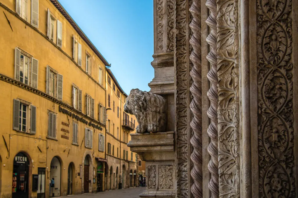 The richly ornamented doorway of the National Gallery of Umbria in Palazzo dei Priori in the historic centre - Perugia, Italy - rossiwrites.com