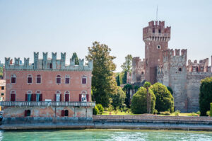 Waterside view of the Scaliger Castle in the town of Lazise - Lake Garda, Italy - rossiwrites.com