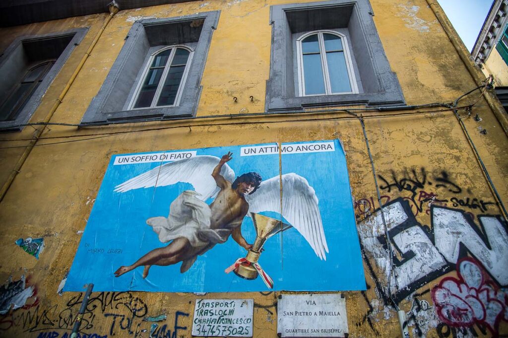 A Maradonna poster in the historic centre - Naples, Italy - rossiwrites.com