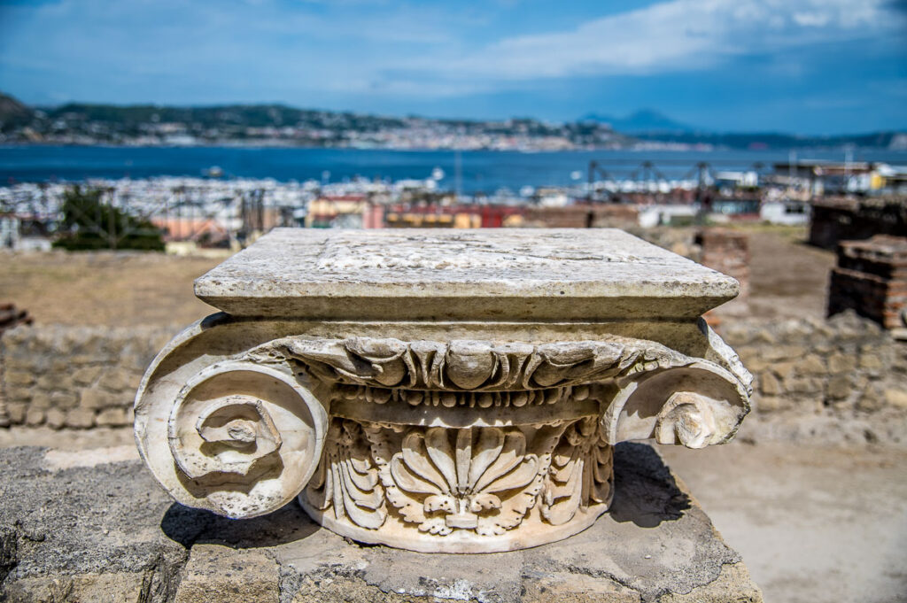 A capital in the Roman terme in Baia with a view of the gulf - Naples, Italy - rossiwrites.com
