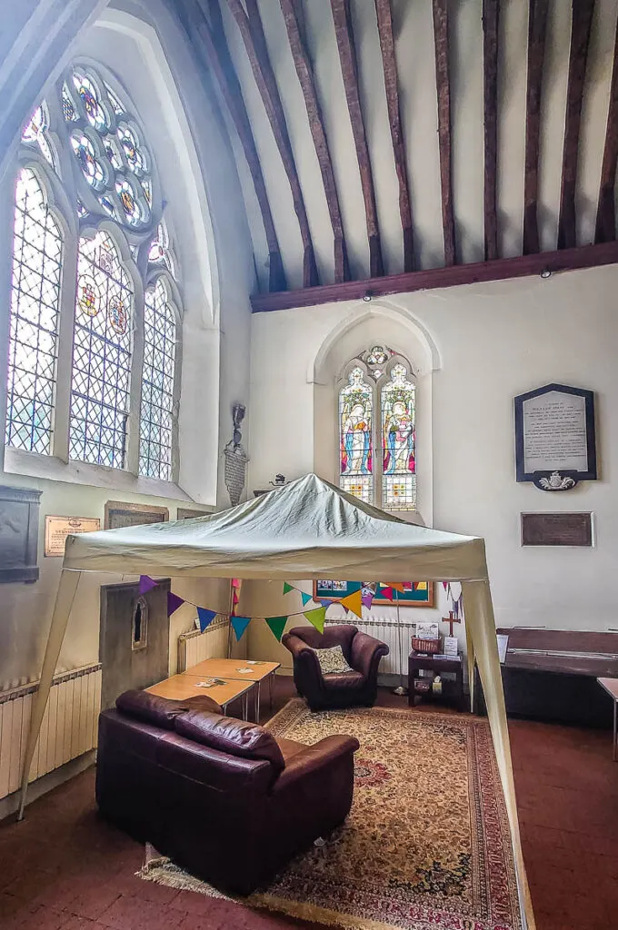 A community seating area in the Church of St. James in the village of Shere - Surrey, England - rossiwrites.com