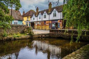 A parade of old houses on Middle Street and the River Tillingbourne in the village of Shere - Surrey, England - rossiwrites.com