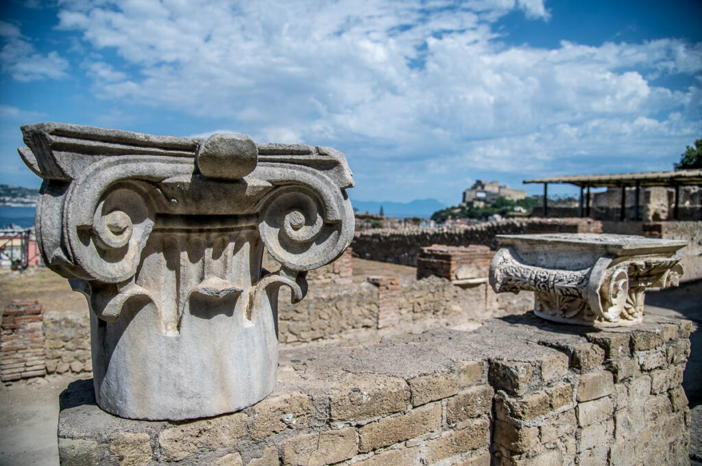 Capitals in the Roman terme in Baia with a view of the gulf - Naples, Italy - rossiwrites.com