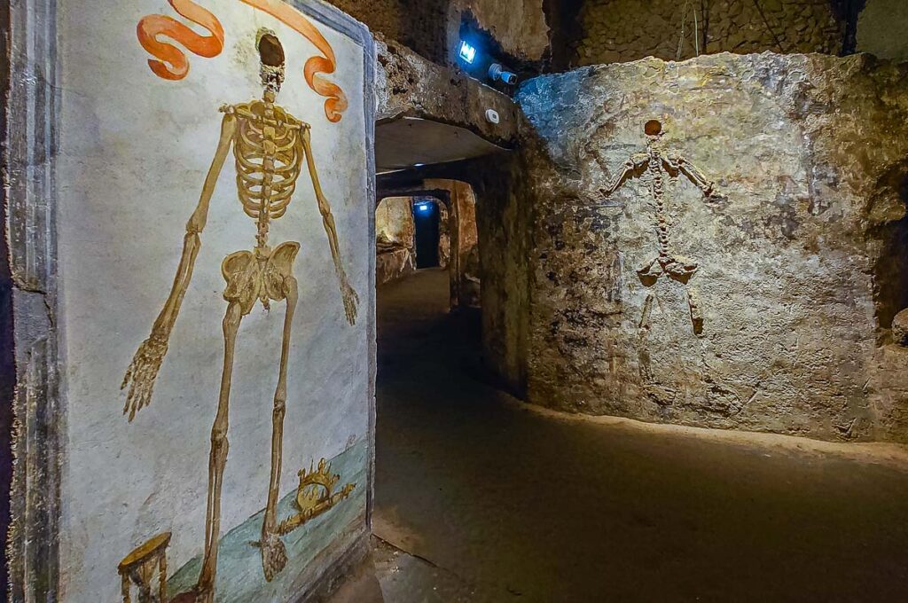 Entombed skeletons covered with frescoed walls - Catacombs of San Gaudioso - Rione Sanita - Naples, Italy - rossiwrites.com