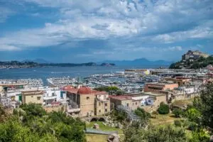 Mollo di Baia with a view of the gulf and the Aragon Castle - Naples, Italy - rossiwrites.com
