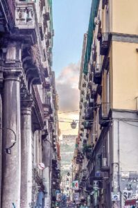 Spaccanapoli with Castel Sant'Elmo in the distance - Naples, Italy - rossiwrites.com