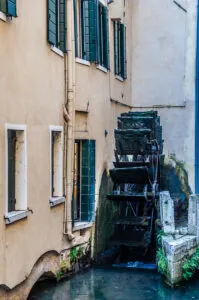A paddle wheel of a watermill in Cagnan Grande - Treviso, Italy - rossiwrites.com
