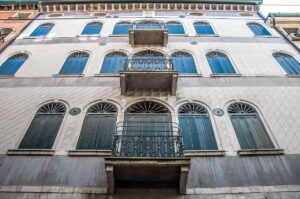 Beautiful facade with shutters and small balconies - Treviso, Italy - rossiwrites.com