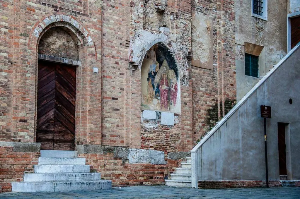 Faded fresco on the brick wall the St. John's Baptistery - Treviso, Italy - rossiwrites.com