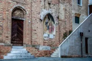 Faded fresco on the brick wall the St. John's Baptistery - Treviso, Italy - rossiwrites.com
