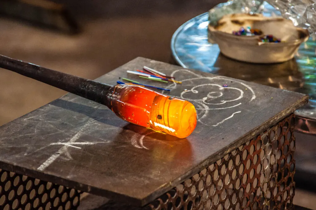 Making a glass the traditional way in a glassmaking workshop - Murano, Veneto, Italy - rossiwrites.com
